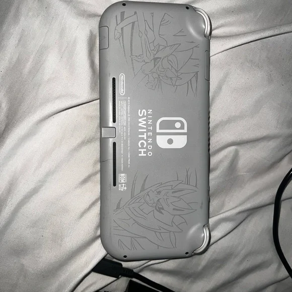 Special Edition 2019 Pokémon Nintendo Switch Lite Gray with Red and Blue Buttons - Picture 2 of 8